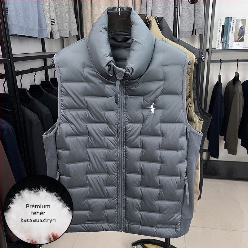 Pehelytöltésű mellény állig érő gallérral, elülső cipzárral, zipzáros zsebekkel, téli viselet