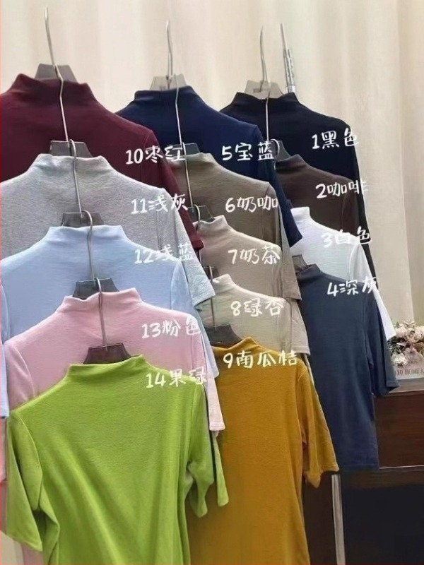 Női slim-fit középmagasságú ujjú felső, kis magas gallér, kasmír-modál anyag, rövid hossz 40–50 cm