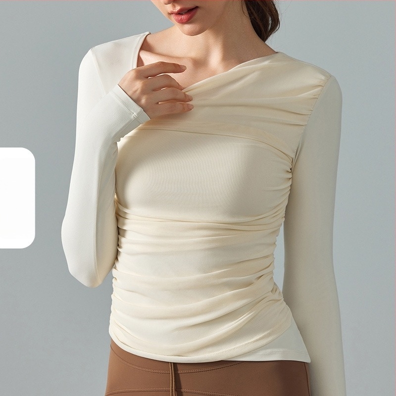 Női hosszú ujjú jóga felső beépített melltartóbetéttel, ferde gallérral és szabálytalan dizájnnal; nylon-spandex anyag és spandex bélés