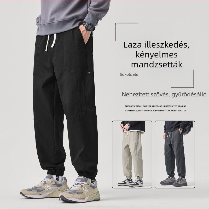 Patchwork csíkos munkaruházati nadrág, bokáig érő, laza szabású, középső derék, húzózsinóros zárás