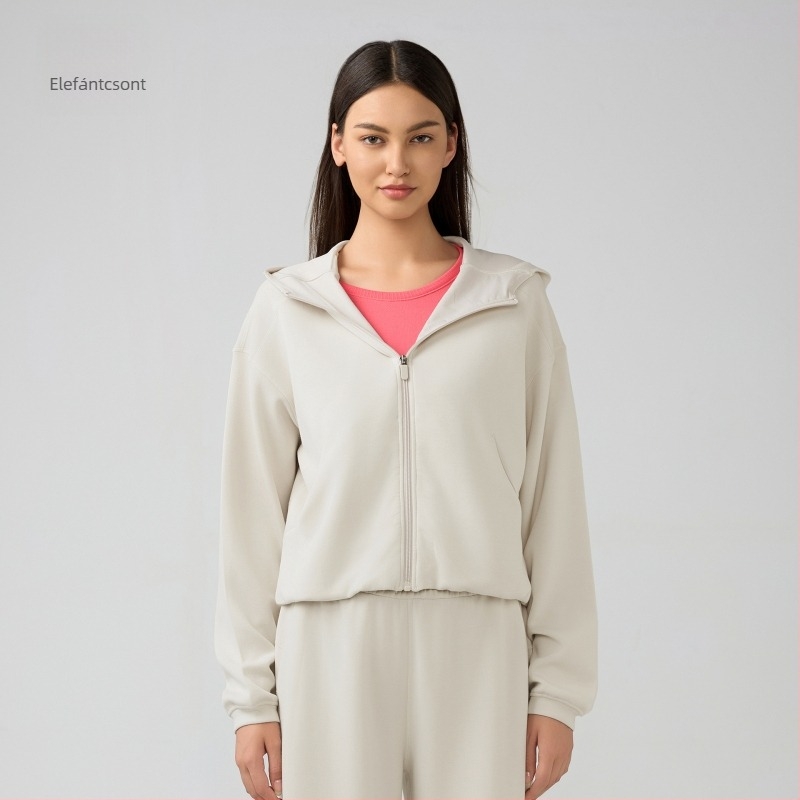 Női kapucnis cipzáros pulóver, lazán szabott, futáshoz és edzéshez, őszi-téli szezon; pamutkeverék anyag 52% poliészter; belső bélés pamut.