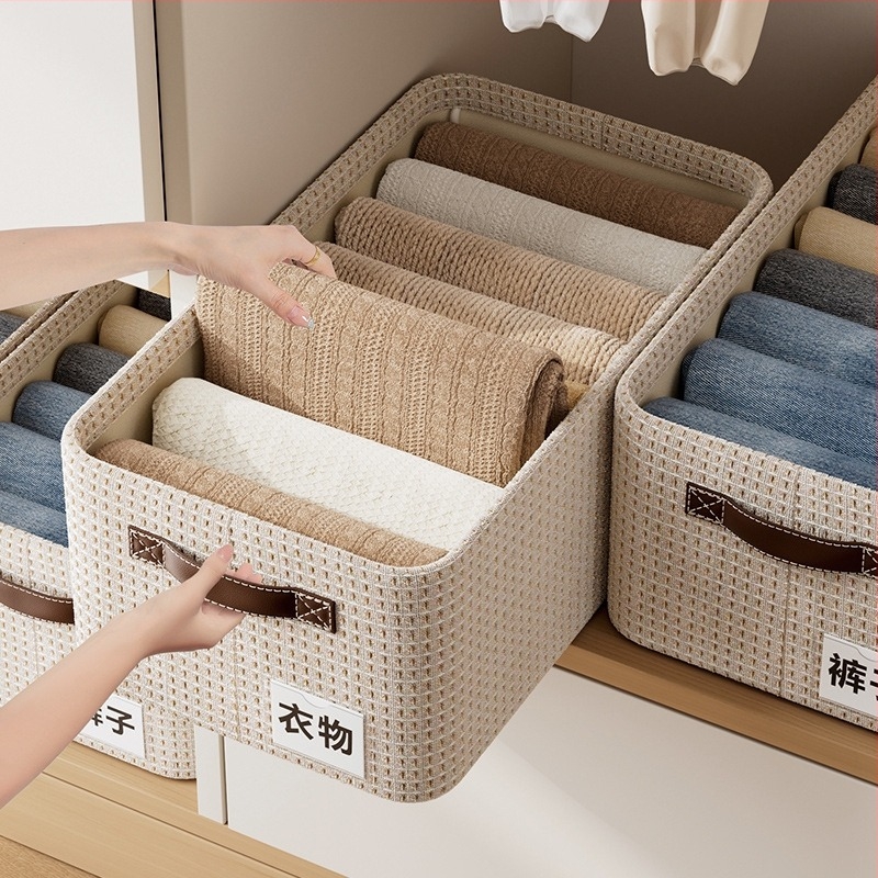 Ruhák tárolására szolgáló doboz, összecsukható, 26 L kapacitású, textil anyagú, egymásra tehető