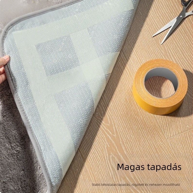 Textil alapú kettős oldalú ragasztószalag erős tapadással és csúszásmentes alátéttel, padlóhoz és tapétához; rögzítés ragasztással