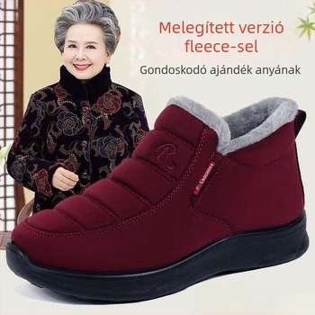 Női téli pamut csizma, középmagas felső rész szintetikus bőrrel, belső réteg műszőrmével, gumitalp, vízálló és csúszásmentes.