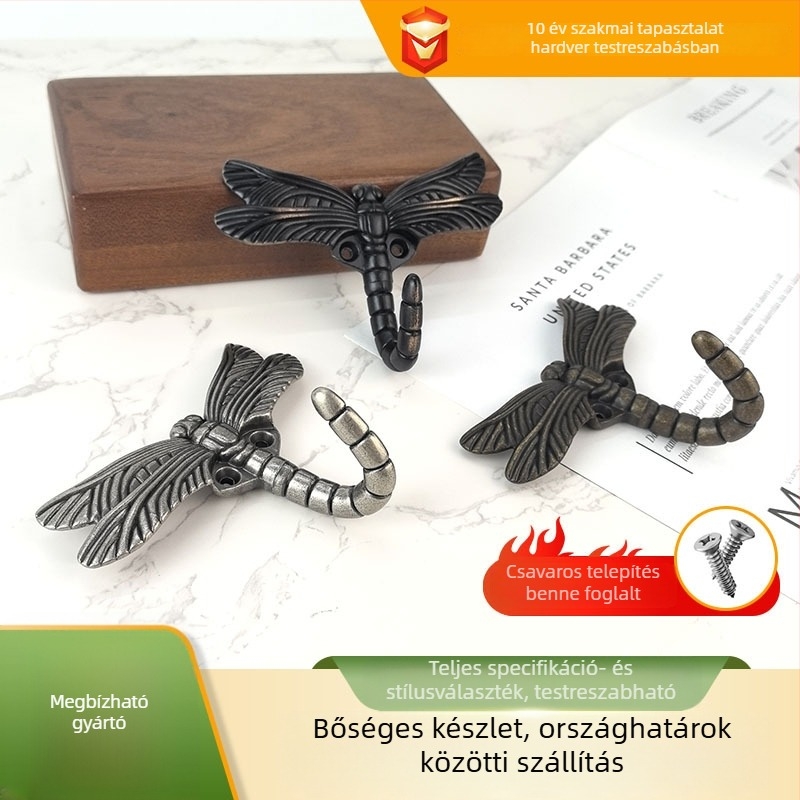 Ruhakasztó cinkötvözetből, szitakötő alakú, falra szerelhető, egy darabos, előfúrt lyukakkal
