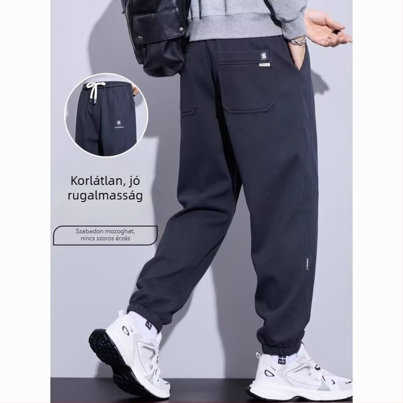 Férfi melegítő nadrág, alacsony derék, cipzáras zárás, egyenes szabás, kézzel rajzolt dizájn