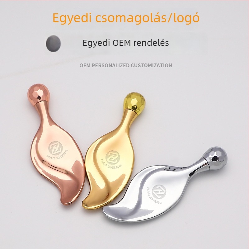 Leveles alakú kozmetikai eszköz egy gömbfejjel és fém görgővel - cinkötvözet, kézi használat