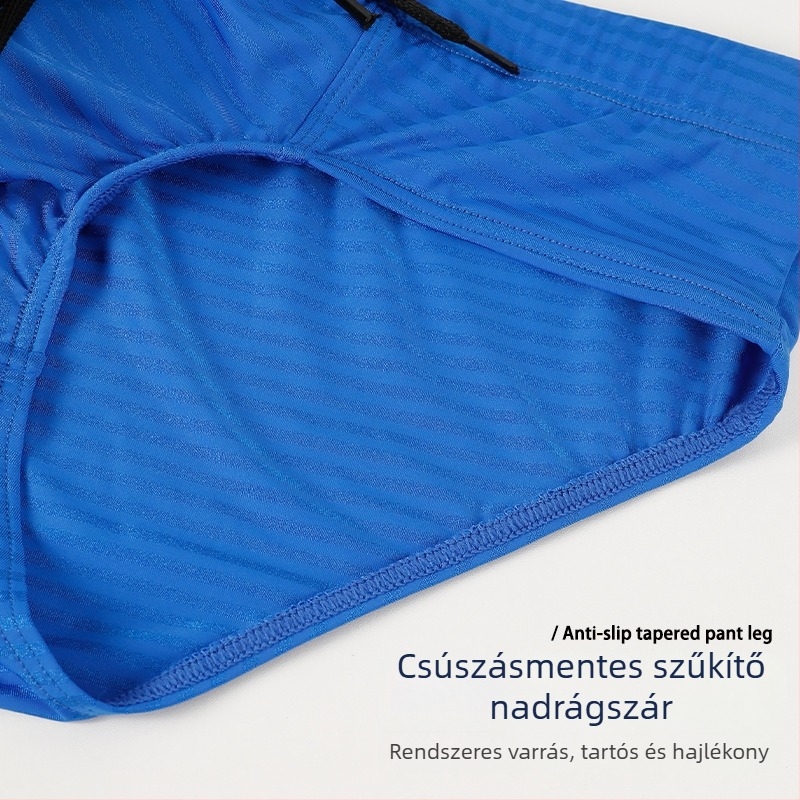Férfi úszó briefs, húzózsinórral, gyorsan száradó nylon anyag, bélés: nylon 90%, 180 g/m², egyszínű minta