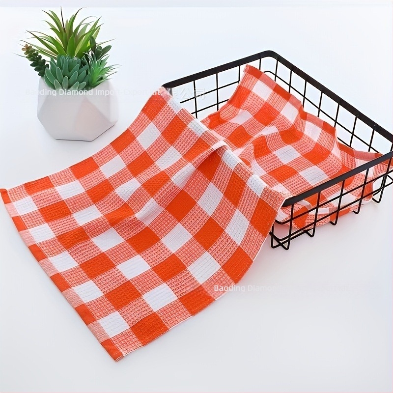 100% pamutból készült waffle-szövésű konyharuha, kockás mintával, nedvszívó az edények és tálak szárazításához