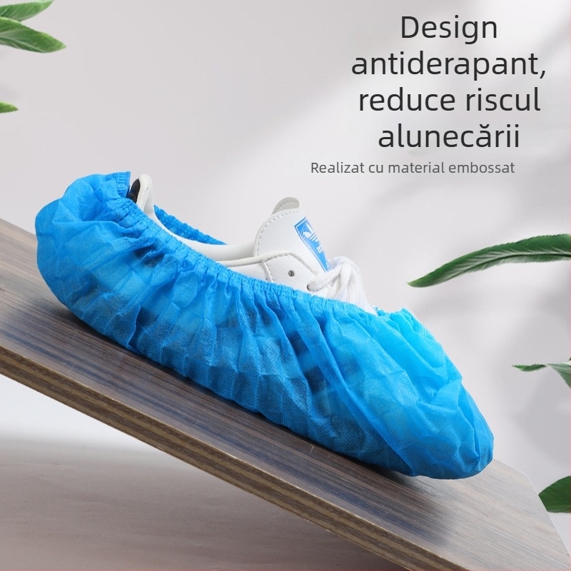 Coveruri de încălțăminte de unică folosință din material nețesut, groase, respirante, anti-derapare, protecție împotriva prafului; grosime 300 g; 100 buc./ambalaj; pentru uz casnic
