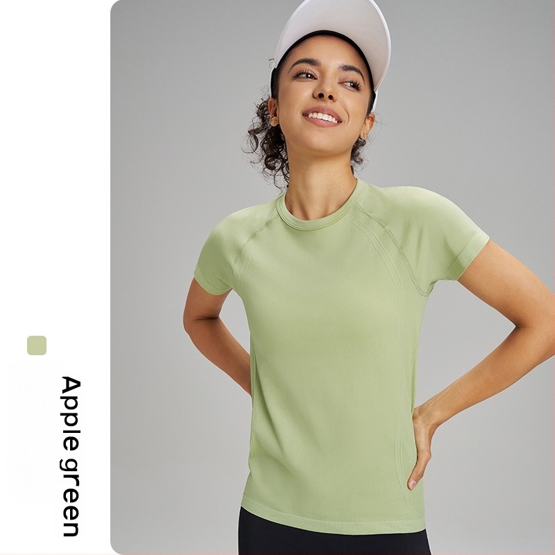 Tricou de yoga pentru exterior pentru femei: respirabil, foarte elastic și uscare rapidă; material din amestec de fibre chimice; compoziție: 63% nylon + 37% poliester; mânecă scurtă; croială slim; lungime până la șold; pentru femei.
