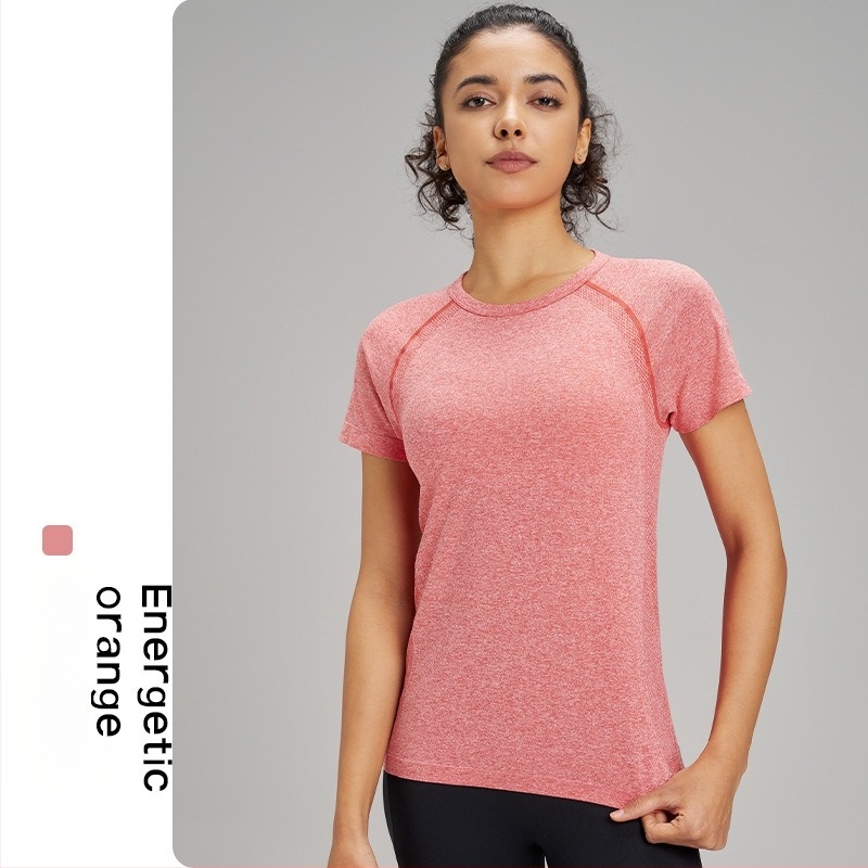 Tricou de yoga pentru exterior pentru femei: respirabil, foarte elastic și uscare rapidă; material din amestec de fibre chimice; compoziție: 63% nylon + 37% poliester; mânecă scurtă; croială slim; lungime până la șold; pentru femei.