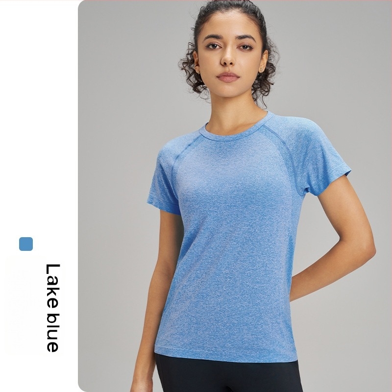 Tricou de yoga pentru exterior pentru femei: respirabil, foarte elastic și uscare rapidă; material din amestec de fibre chimice; compoziție: 63% nylon + 37% poliester; mânecă scurtă; croială slim; lungime până la șold; pentru femei.