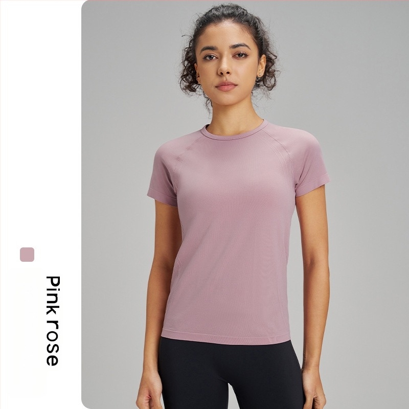 Tricou de yoga pentru exterior pentru femei: respirabil, foarte elastic și uscare rapidă; material din amestec de fibre chimice; compoziție: 63% nylon + 37% poliester; mânecă scurtă; croială slim; lungime până la șold; pentru femei.