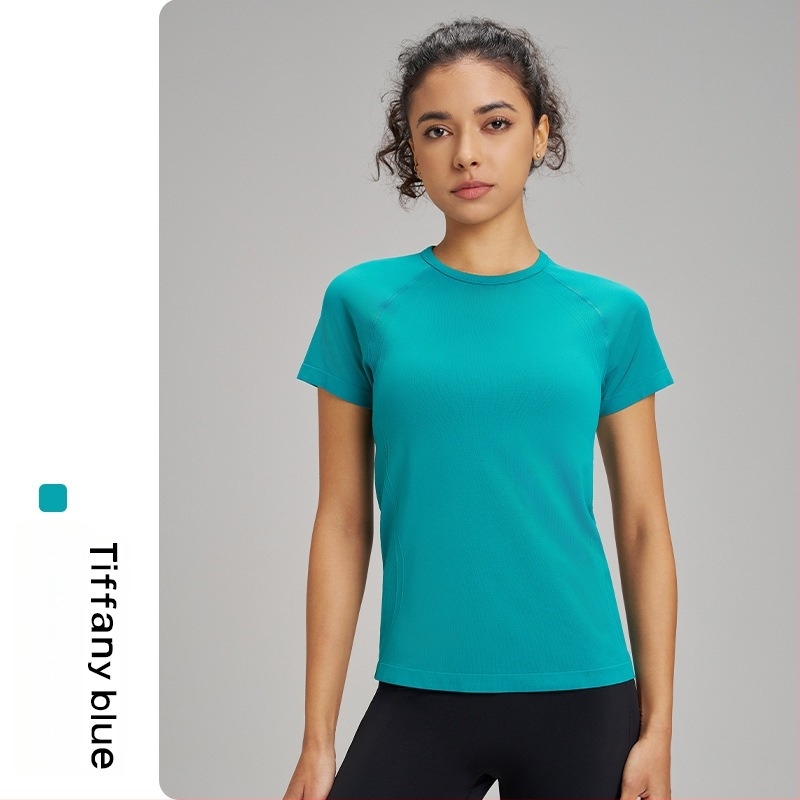 Tricou de yoga pentru exterior pentru femei: respirabil, foarte elastic și uscare rapidă; material din amestec de fibre chimice; compoziție: 63% nylon + 37% poliester; mânecă scurtă; croială slim; lungime până la șold; pentru femei.