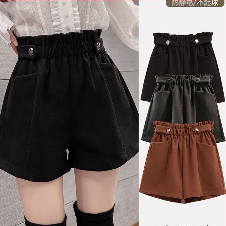 Pantaloni largi din lână, talie elastică, lungime 3/4, buzunare